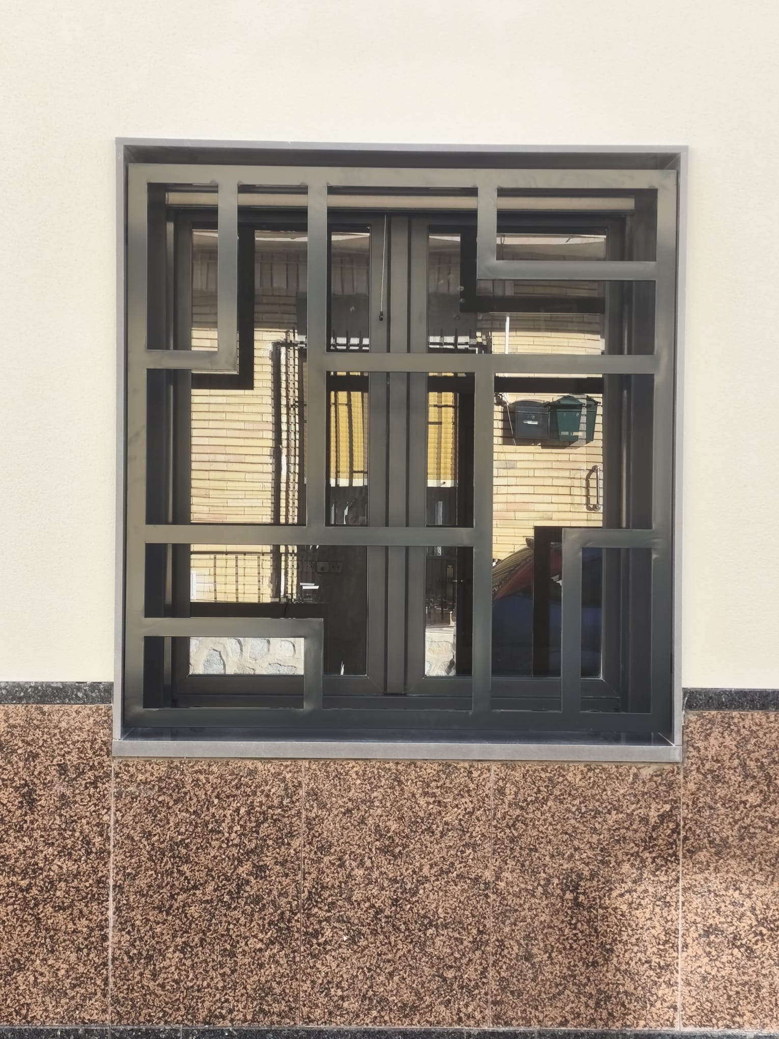 Reja de ventana geométrica
